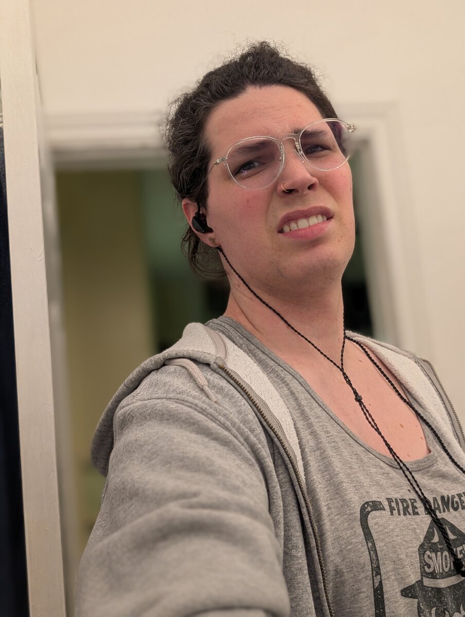 Harper taking a mirror selfie